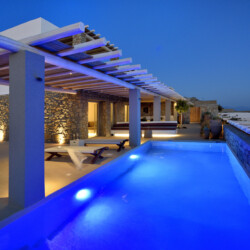 night life at villa ammolite in mykonos, lightened swimming pool