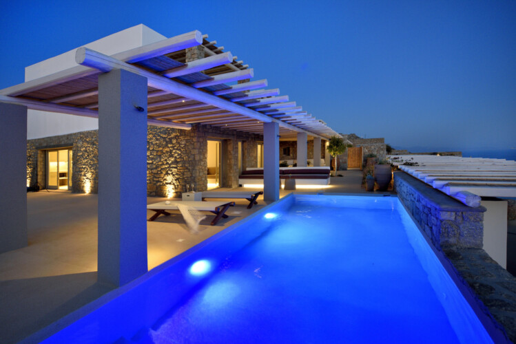 night life at villa ammolite in mykonos, lightened swimming pool