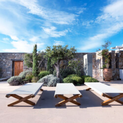 sunny day at the terrace with sunbeds at villa ammolite in mykonos